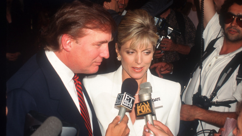 Donald Trump and Marla Maples speaking to the press