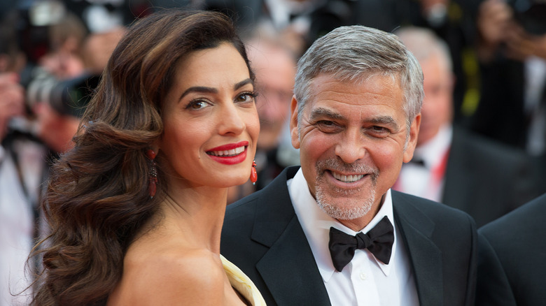 Amal Clooney and George Clooney smiling