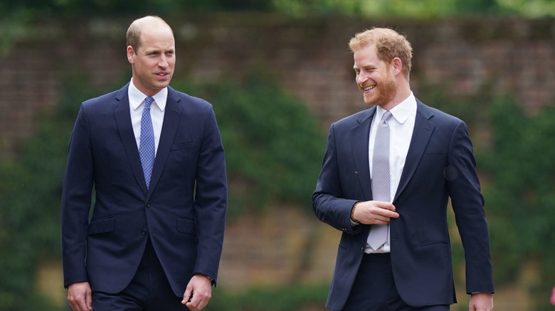 Prince Harry laughing with Prince William