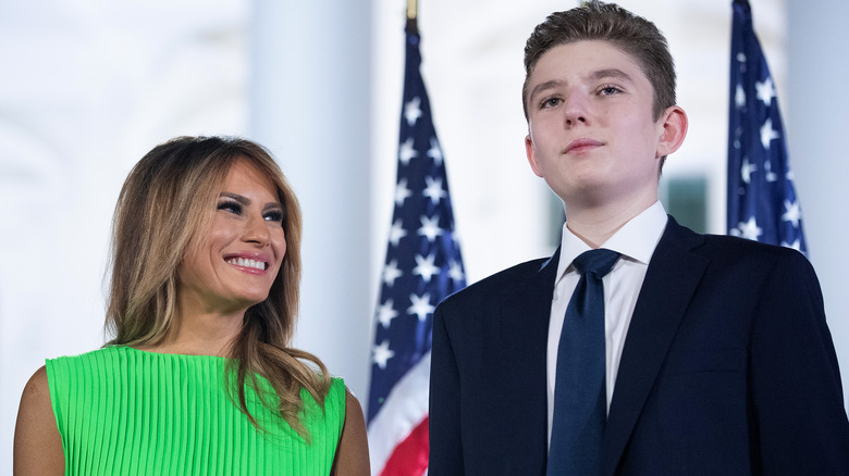 Melania smiles at Barron Trump