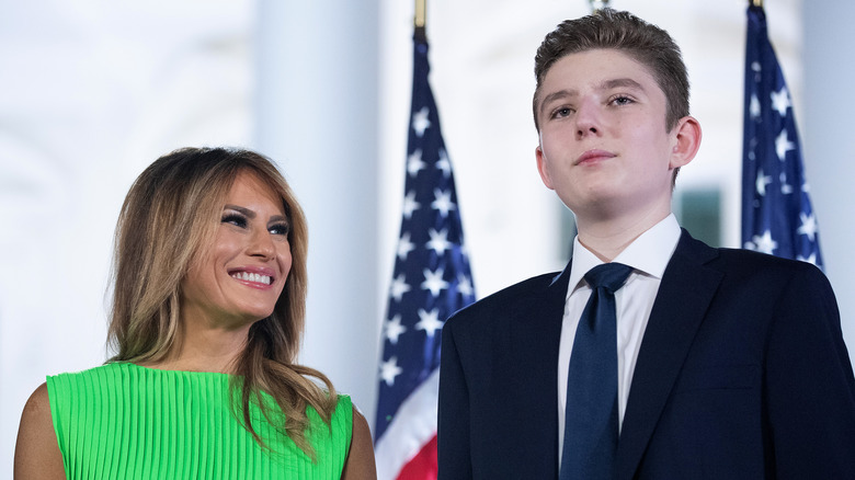 Melania smiling proudly Barron Trump