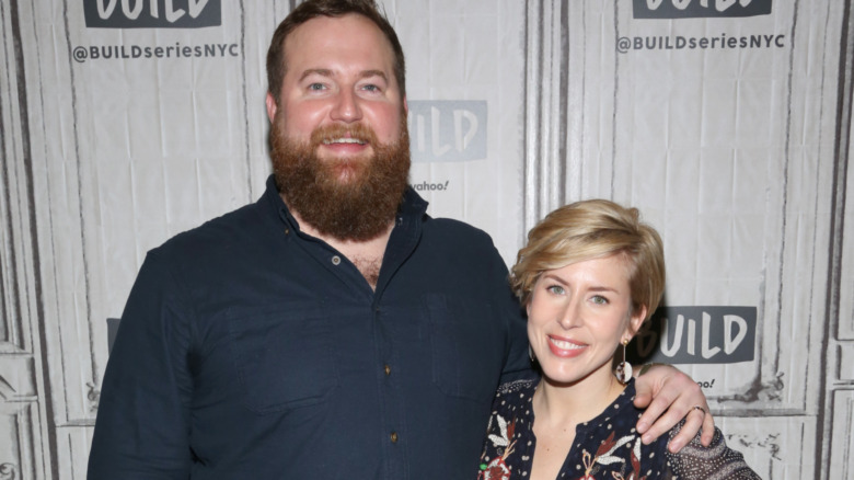 Ben and Erin Napier pose together at an event