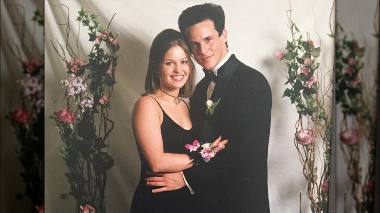 Candace Cameron Bure and Scott Weinger posing in prom photo