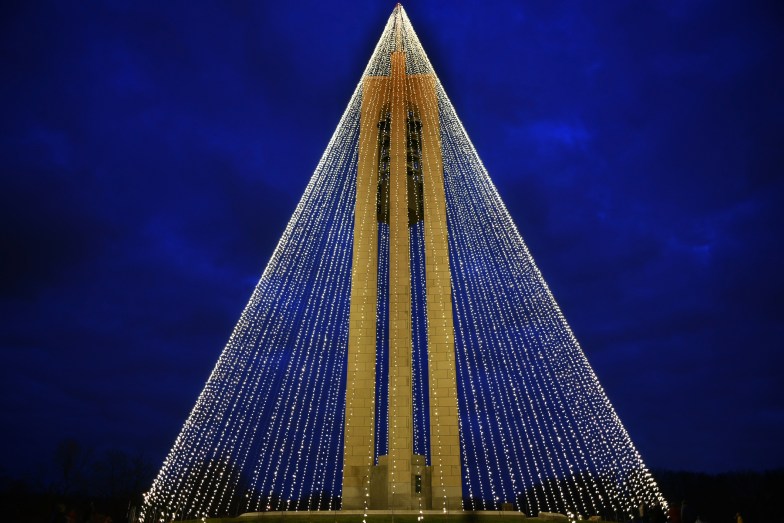 The Carillon Bell Tower illuminated during the holiday season