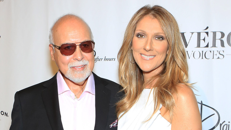 Rene Angelil and Celine Dion pose