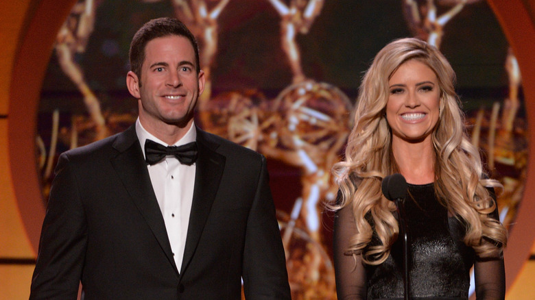 Tarek and Christina El Moussa presenting on stage