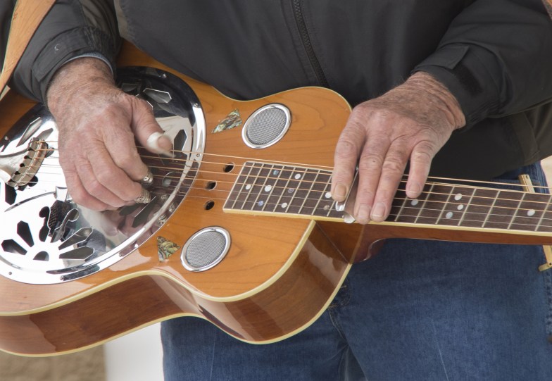 A muscian plays the Dobro in a Bluegrass Band in Myrtle Beach 