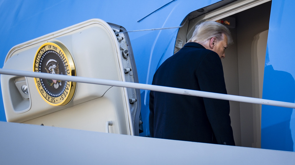 Donald Trump walking into Air Force One 