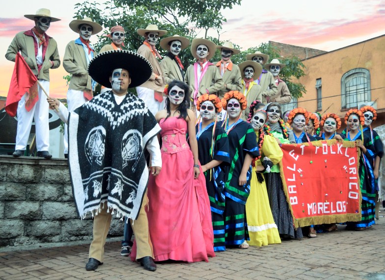 Members of Morelos folkloric dance school dressed for Day of the Dead parade, Cuernavaca, Mexico