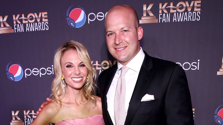 Elisabeth Hasselbeck poses with her husband Tim on red carpet