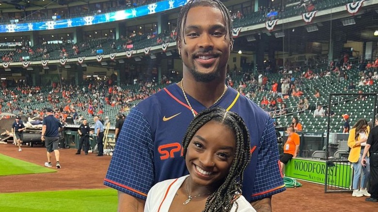 Jonathan Owens, posing with Simone Biles