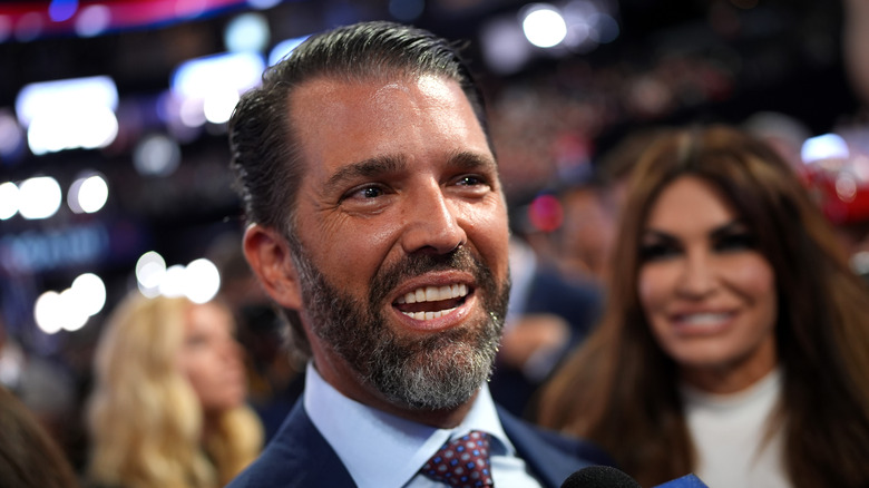 Donald Trump Jr. speaking to reports at the RNC