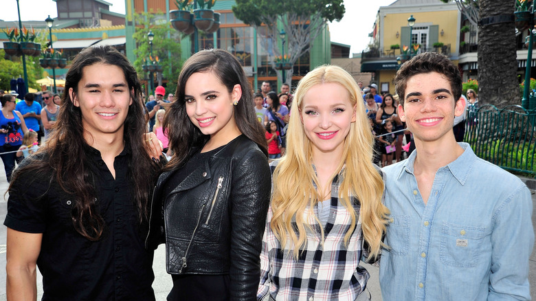 Cameron Boyce poses with Booboo Stewart, Sofia Carson, and Dove Cameron