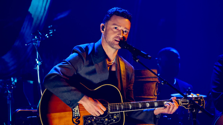 Justin Timberlake singing and playing guitar