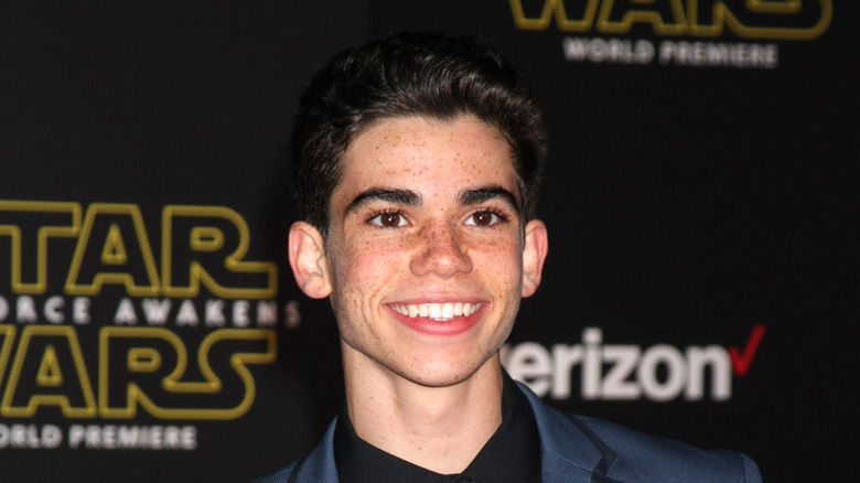 Cameron Boyce smiling on the red carpet