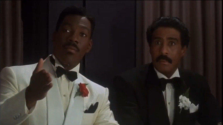 Eddie Murphy and Richard Pryor wearing tuxedos