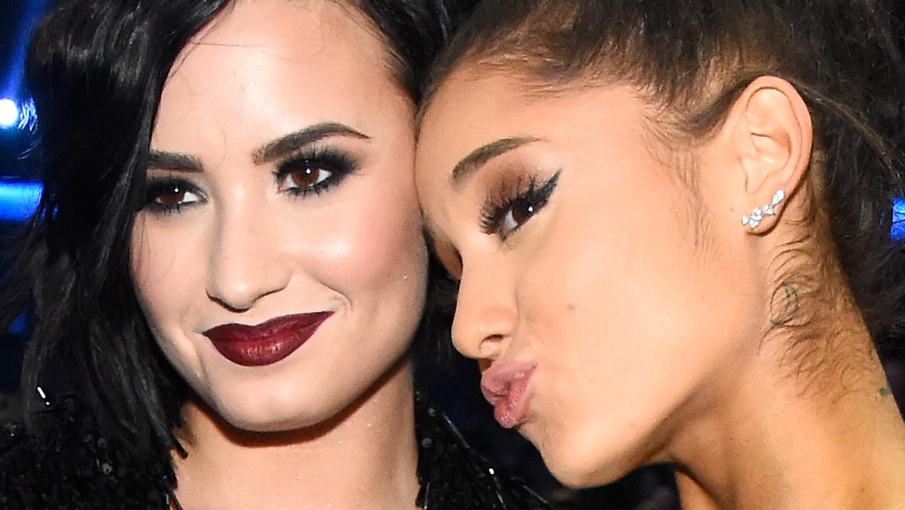 Demi Lovato and Ariana Grande pose for a picture