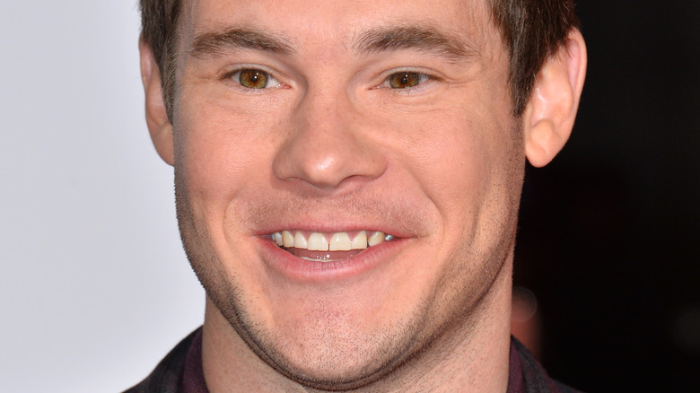 Adam DeVine smiling