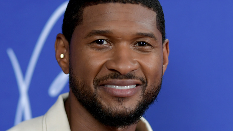 Usher Raymond IV smiling