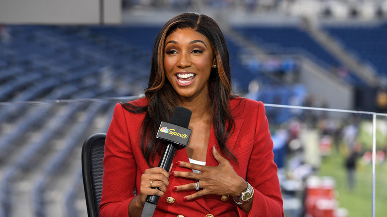 Maria Taylor wearing red