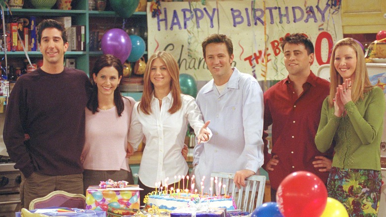 Friends cast smiling on-set