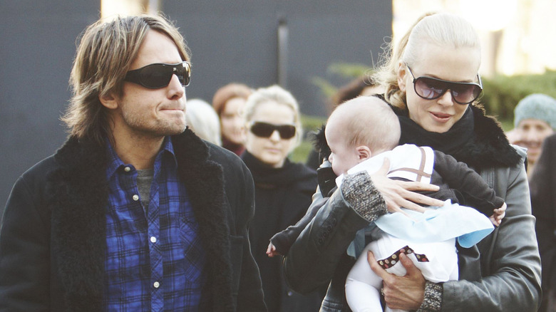 Keith Urban, Nicole Kidman walking with baby Sunday Rose