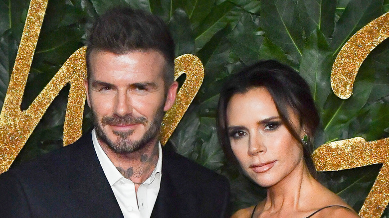 David and Victoria Beckham posing