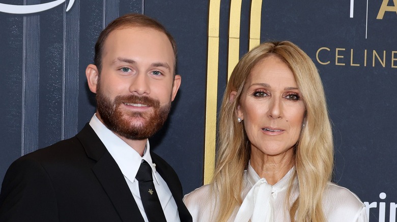 René-Charles Angélil and Celine Dion smiling