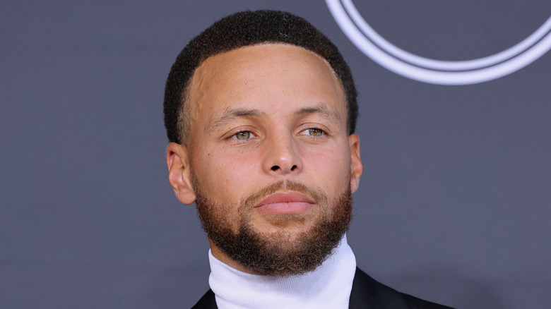 Steph Curry poses in turtleneck