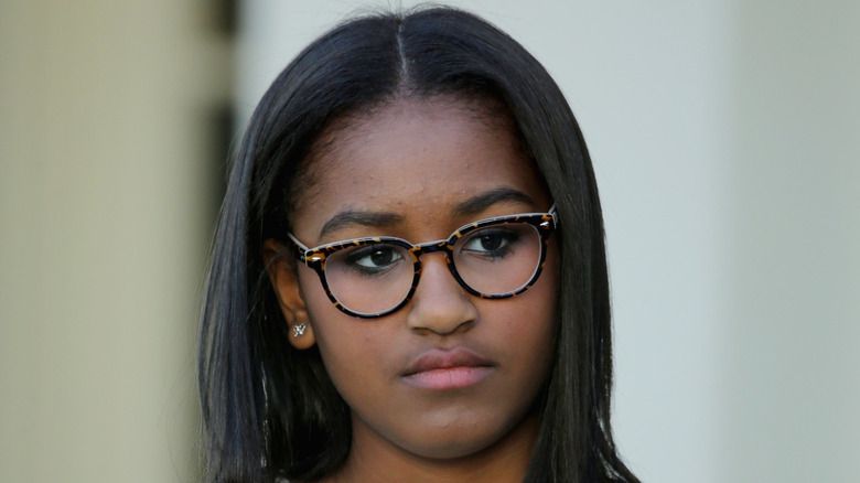 Sasha Obama in glasses