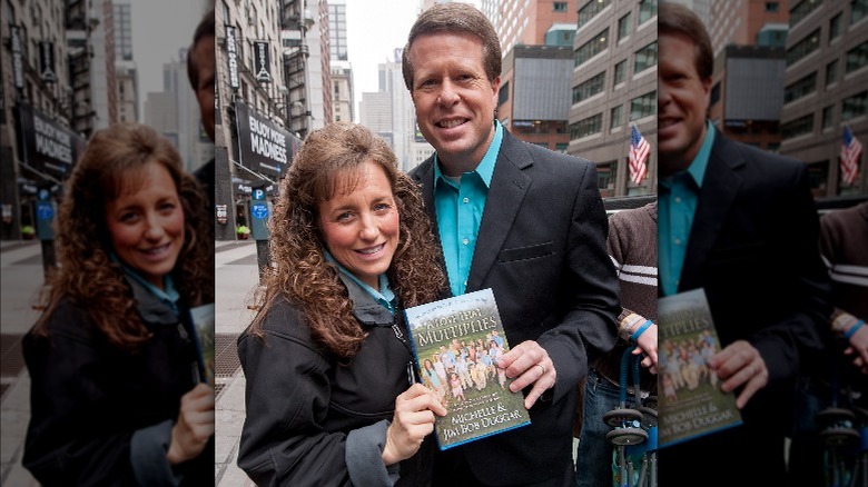 Jim Bob and Michelle Duggar show off their book