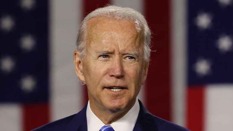 Joe Biden in front of American flag