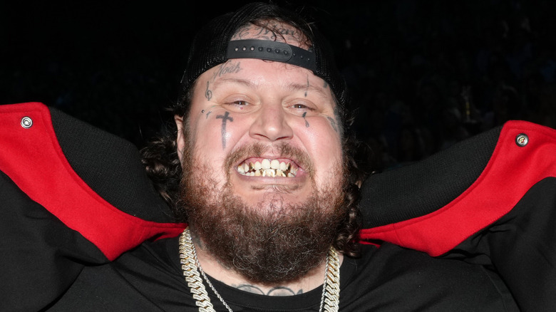 Jelly Roll showing teeth