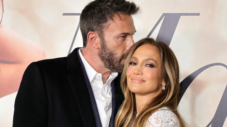 Ben Affleck kissing Jennifer Lopez's hair