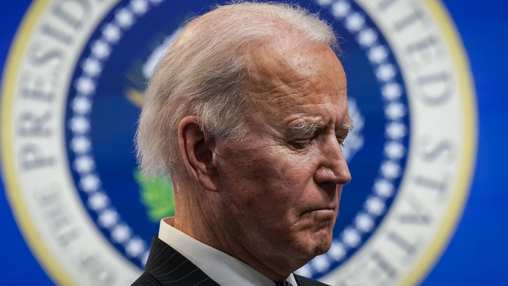 Joe Biden profile sad presidential seal