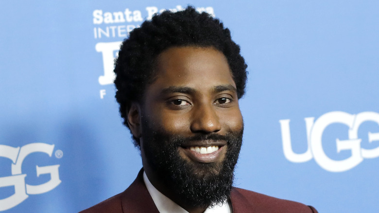 John David Washington smiling