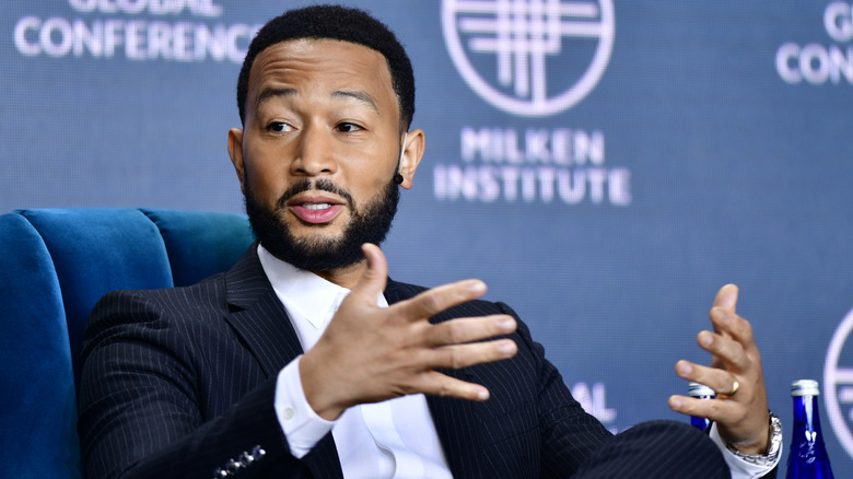 John Legend gesturing