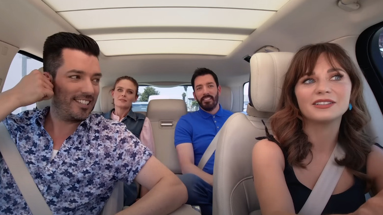 Jonathan Scott, Zooey Deschanel inside vehicle