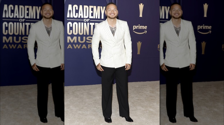 Kane Brown wearing white pinstriped blazer