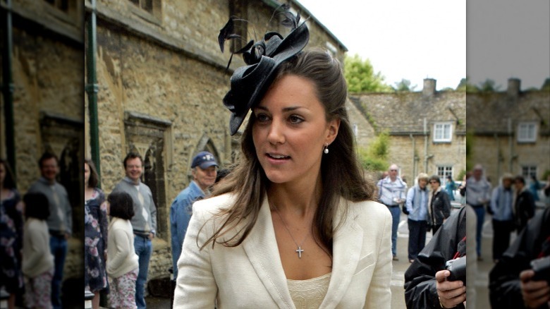 young Kate Middleton wearing hat