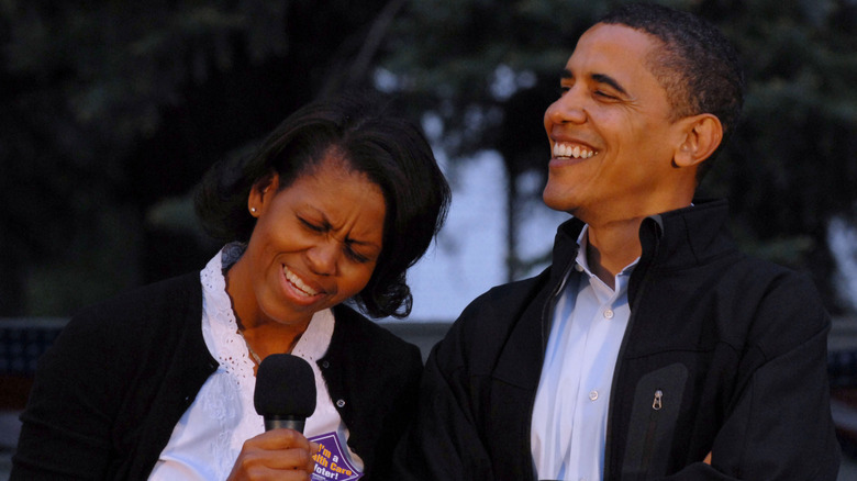 Michelle and Barack Obama laughing