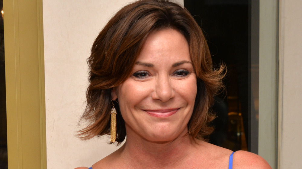 Luann de Lesseps smirking