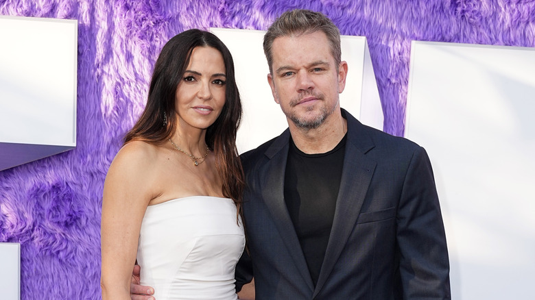 Luciana Barroso and Matt Damon on a red carpet