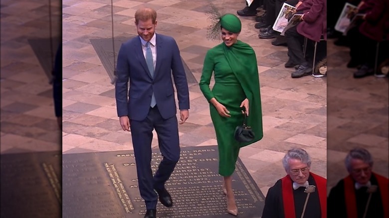 Prince Harry and Meghan Markle walking