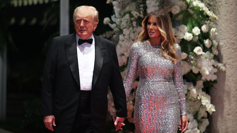 Donald, Melania Trump holding hands