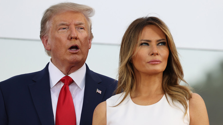 Donald Trump open mouth, Melania Trump looking up