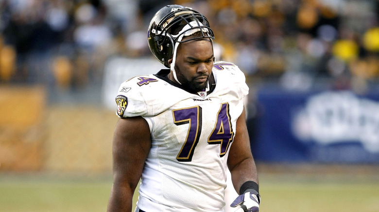 Michael Oher helmet pushed up