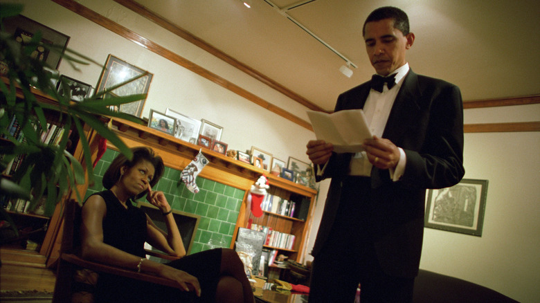 Michelle Obama looking unimpressed with Barack Obama