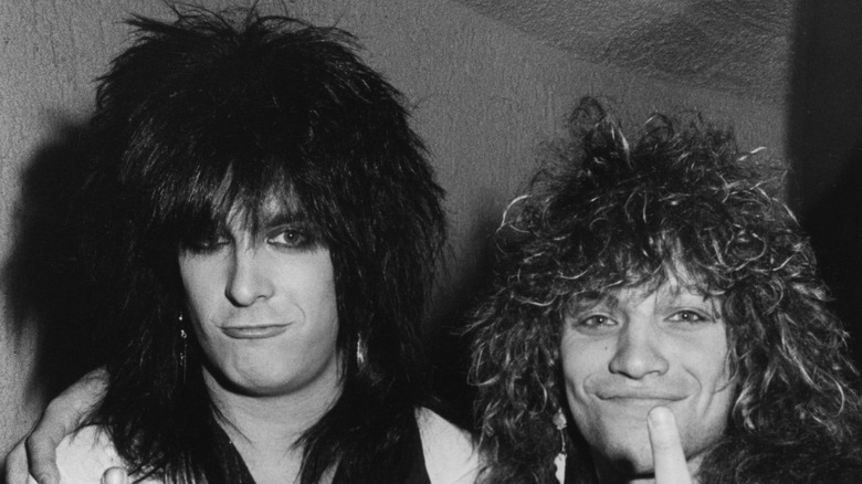 Nikki Sixx and Bon Jovi posing in 1985