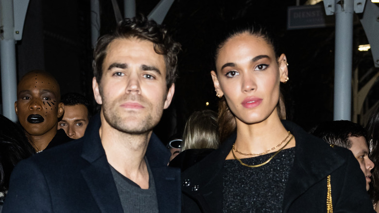 Paul Wesley and Natalie Kuckenburg at an event